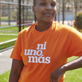 Ni Uno Más Wear Orange Tee