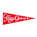 Red felt pennant with white cursive text  that reads Keep Going with a white heart to the right of the text