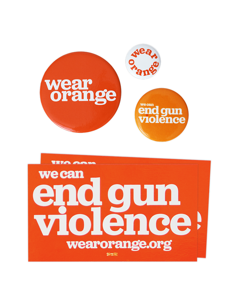 Three circular buttons of different sizes. Largest button is dark orange with a white Wear Orange logo. Medium button is light orange with white text that reads: we can end gun violence. Smallest button is white with orange text that reads: wear orange. Two identical rectangular orange stickers with white text that reads: we can end gun violence wearorange.org.