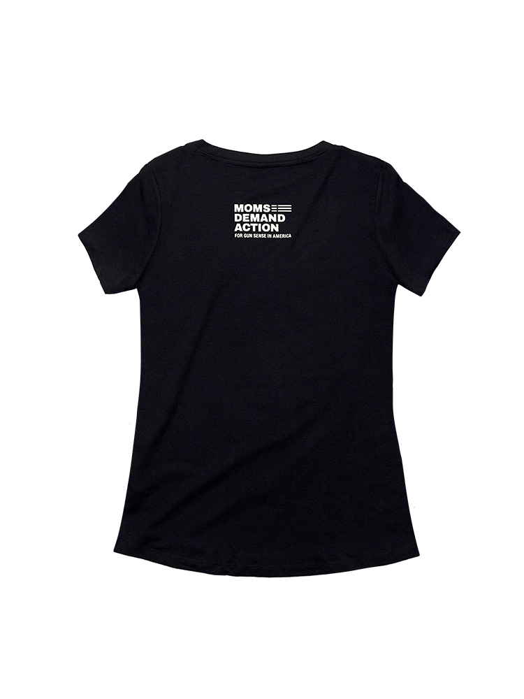 Back view of a short sleeve women's cut tee shirt. A small, white Moms Demand Action logo is printed a couple inches down from the collar.